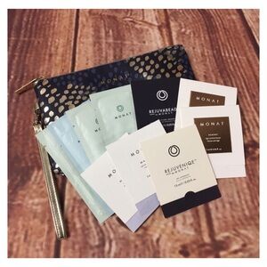 MONAT New Cosmetics Bag/Wristlet Wallet w/Samples